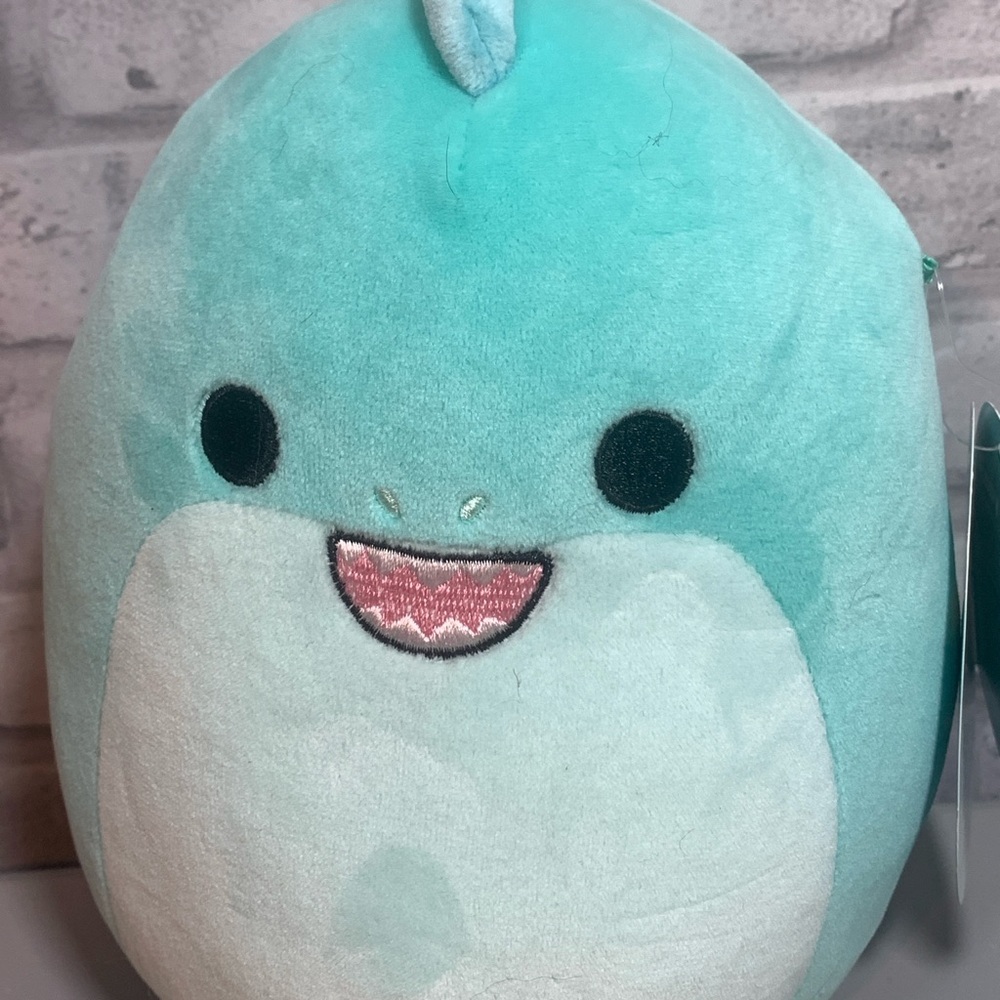 Teal and White Plush Toy